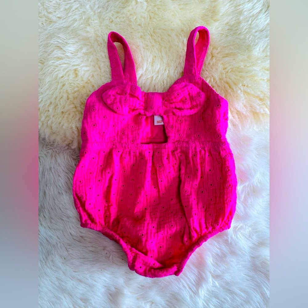 Pink bodysuit
